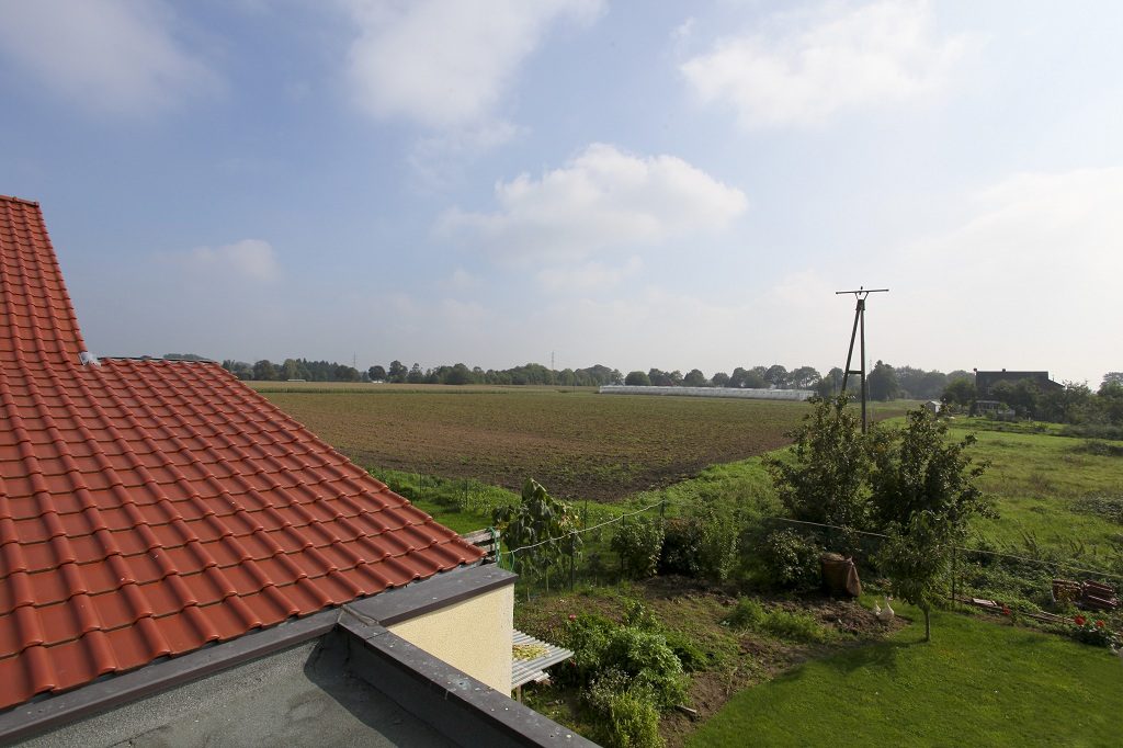 Blick von der Dachterrasse in Hamminkeln über Felder und Wiesen